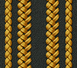 Intricate golden braid patterns on a textured dark background for design and artistic inspiration.