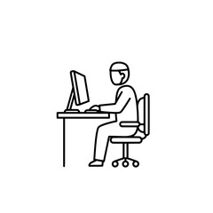 Person sitting at a desk working with black lines