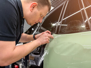 Car wrapping, detailing, tuning and styling. PPF protective film against chips and scratches. Car...
