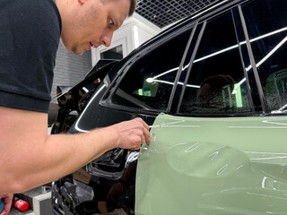 Car wrapping, detailing, tuning and styling. PPF protective film against chips and scratches. Car...