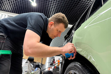 Car wrapping, detailing, tuning and styling. PPF protective film against chips and scratches. Car...
