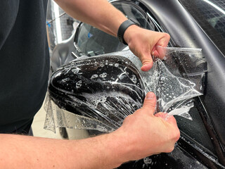 Car wrapping, detailing, tuning and styling. PPF protective film against chips and scratches. Car...