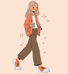 Fashion girl walks with a cup of coffee.
