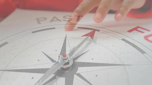 Animation of compass with text over caucasian child reading braille - Powered by Adobe