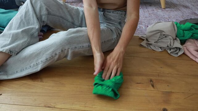 Learn effective methods to fold clothes neatly while sitting on the floor, enhancing organization and saving space in your home. Discover practical tips for tidying up efficiently