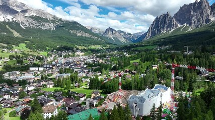 Aerial 4K drone footage of the iconic Hotel Cristallo in Cortina d’Ampezzo, Italy, during its major renovation ahead of the Milano-Cortina 2026 Winter Olympics.