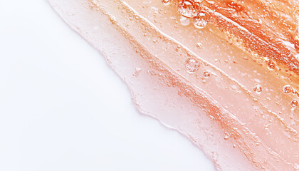 Fototapeta premium Close-up of cosmetics texture on white background. Translucent beige gel with air bubbles. Horizontal image with copy space