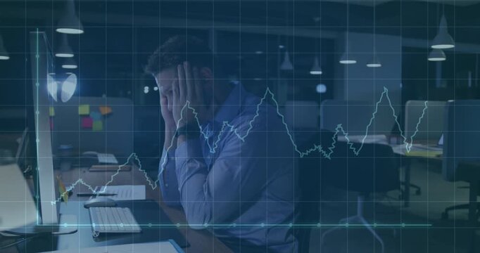 Animation of financial data processing over caucasian businessman using computer in office - Powered by Adobe