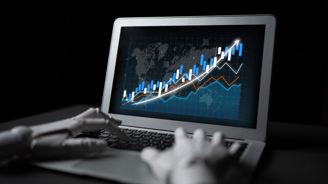 A robotic hand operates a laptop displaying advanced analytics with stock market graphs in a sleek dark environment, symbolizing the fusion of technology and finance. Impute