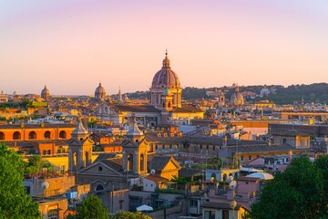 Fototapeta premium Sunset light over the rooftops of Rome