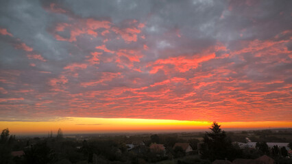 colorful sunset sunrise sky over the Danube river and city of Novi Sad