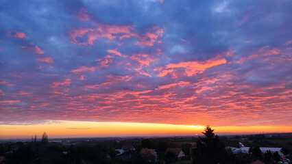 colorful sunset sunrise sky over the Danube river and city of Novi Sad