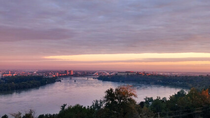 colorful sunset sunrise sky over the Danube river and city of Novi Sad