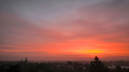 colorful sunset sunrise sky over the Danube river and city of Novi Sad