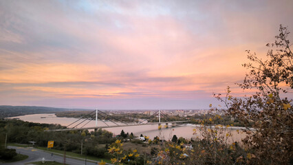 colorful sunset sunrise sky over the Danube river and city of Novi Sad