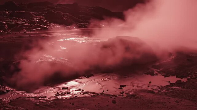 Red Geyser Eruption in a Volcanic Landscape