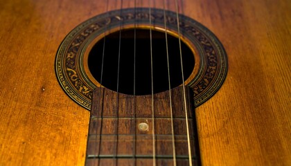 Obraz premium Close-up of a vintage acoustic guitar soundhole