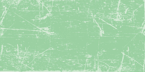 Grunge scratch texture on soft green background. High contrast distressed pattern for print material.