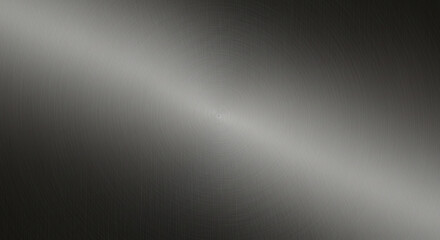 Stunning brushed metal texture with radial pattern and subtle lighting, perfect for modern design projects