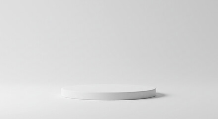 Minimalist white podium stage for product display and presentation against a clean studio background