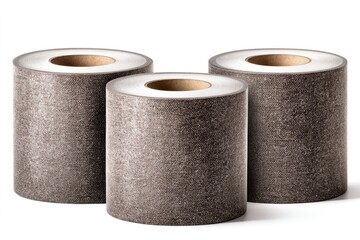 Three textured gray cylinders with hollow cardboard centers, arranged close on a white surface