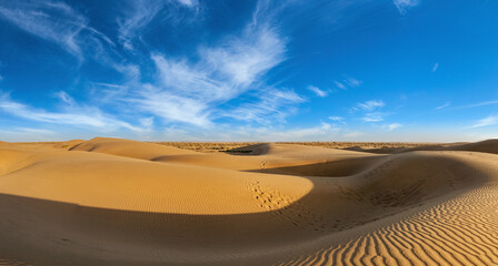 Yellow Sand Dunes Under Blue Sky Environment