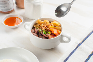 Soto Daging. Soto meat is a soupy dish made from beef stock seasoned with various spices. Perfect for recipes, articles or any cooking content.