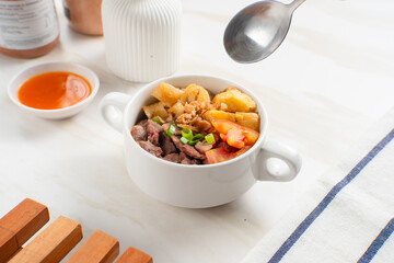 Soto Daging. Soto meat is a soupy dish made from beef stock seasoned with various spices. Perfect for recipes, articles or any cooking content.