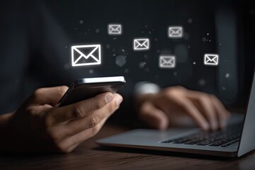 Person using phone and laptop, email icons