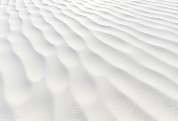 Delicate wave patterns etched into pristine white sand, sunlight reflecting off the surface, summer, fine