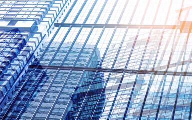 Low shot of visual dynamics of modern glass building background