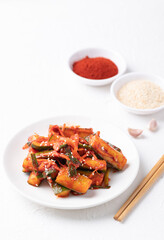 Korean kimchi cucumber on white background, Korean side dish, Homemade food