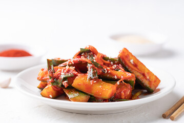 Korean kimchi cucumber on white background, Korean side dish, Homemade food