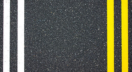 Close up overhead view of a textured asphalt road surface with distinct white double lines and bright yellow and blue painted lane markings