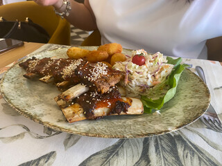 Grilled pork ribs wit salad