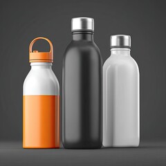 Three reusable water bottles, orange, black, and white, stand on a gray surface