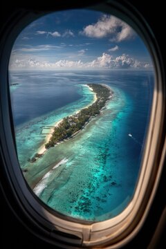 Fototapeta Island paradise seen from airplane window