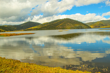 Colorful hills and blue lakes create a serene panorama
Pudacuo National Park, Yunnan, China,...