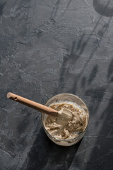 Making homemade sourdough, a fermented mixture of water and flour for use as a starter for baking...