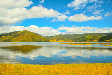 Colorful hills and blue lakes create a serene panorama
Pudacuo National Park, Yunnan, China,...
