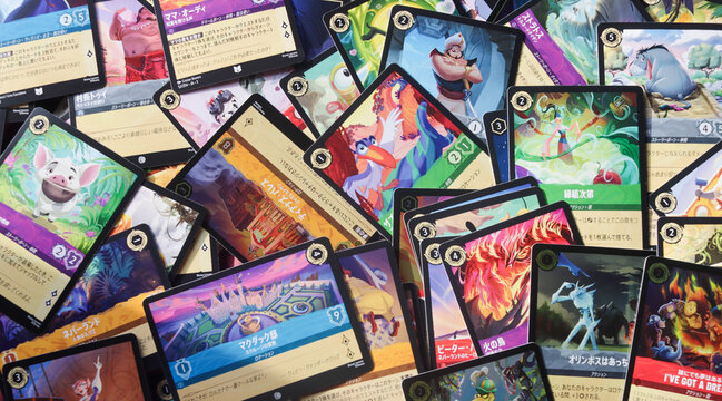 Tokyo, Japan - August 29, 2025 - a bunch of trading cards from the trading card game "disney lorcana" in the language japanese