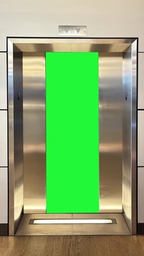 Modern Elevator doors are opening and closing by revealing a green screen seamless loop 4k Footage. Lift door, open, close, copy space.