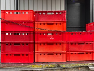 These are Colorful Stacked Red Media Storage Bins, perfect for various organization needs
