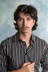 Obraz premium Vertical portrait of a young boy with a retro look