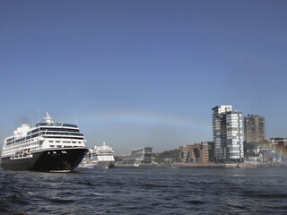 Luxury crusieship cruise ship liner Quest, Journey, Pursuit or Onward arrival sailing into Hamburg Hafen port, Germany on sunny day on River Elbe