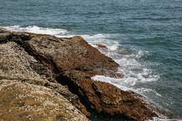 The sea hits the rocks on the Yongmeori Coast.