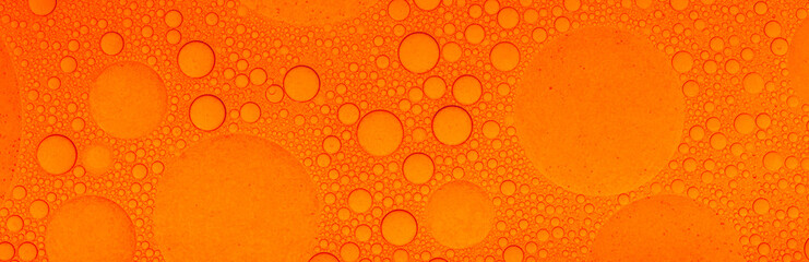 Macro microscope Red bubble texture, Close-up Green bubbles and drops oil background . blue green...