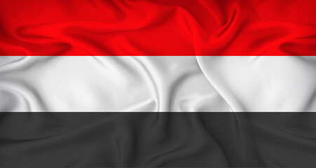 Realistic Yemen flag waving. Close up of flag of Yemen with cloth texture