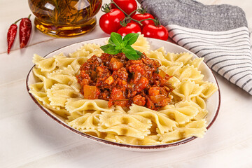 Italian pasta Farfalle Bolognese with meat