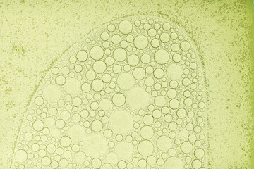 Macro microscope green bubble texture, Close-up Green bubbles and drops oil background . blue green...